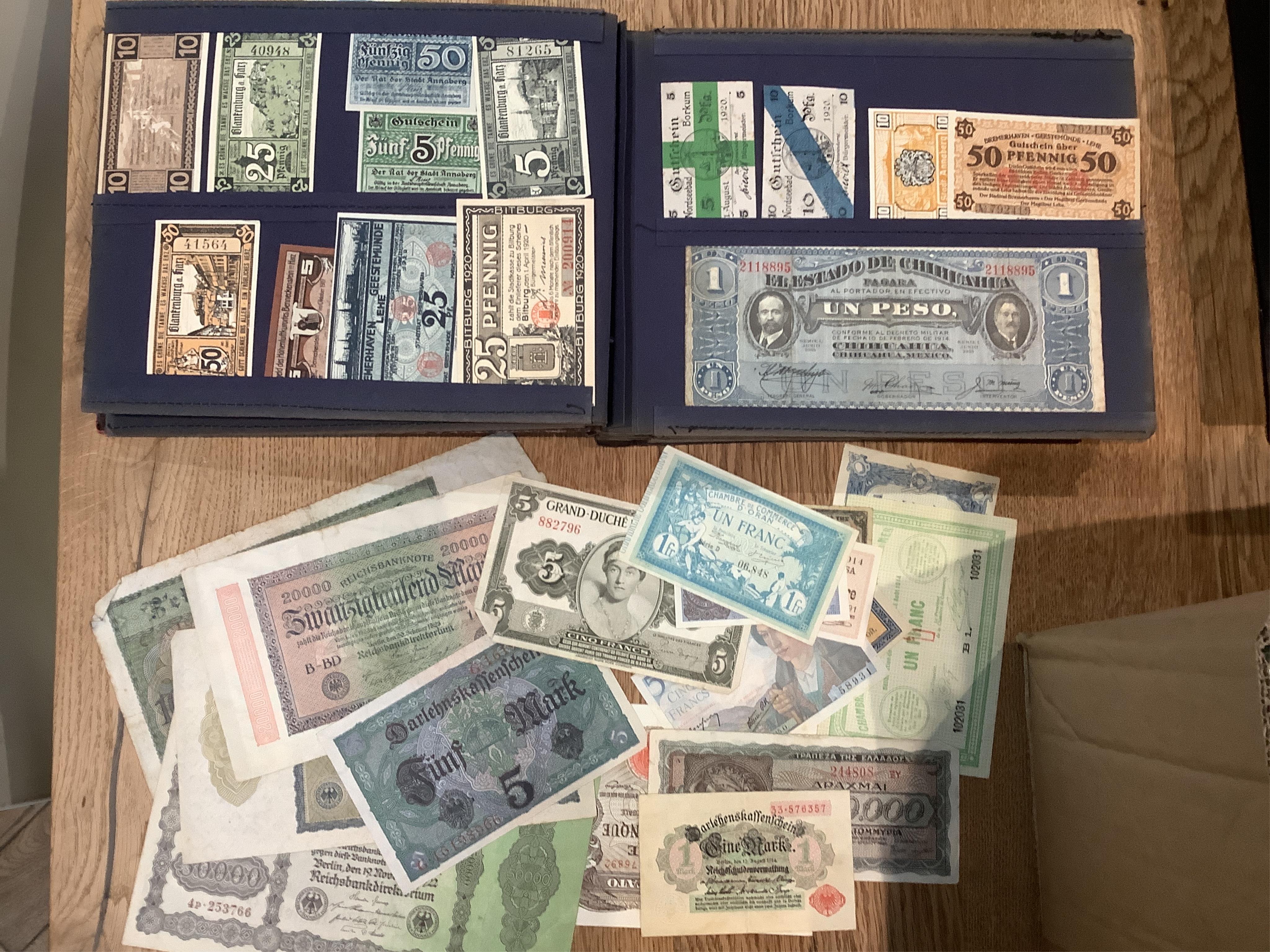 An album of early to mid 20th century French, German and Austrian banknotes